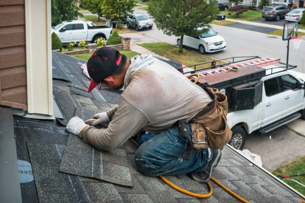 Professional Storm Damage Roof Repair technician working in Ammon, ID
